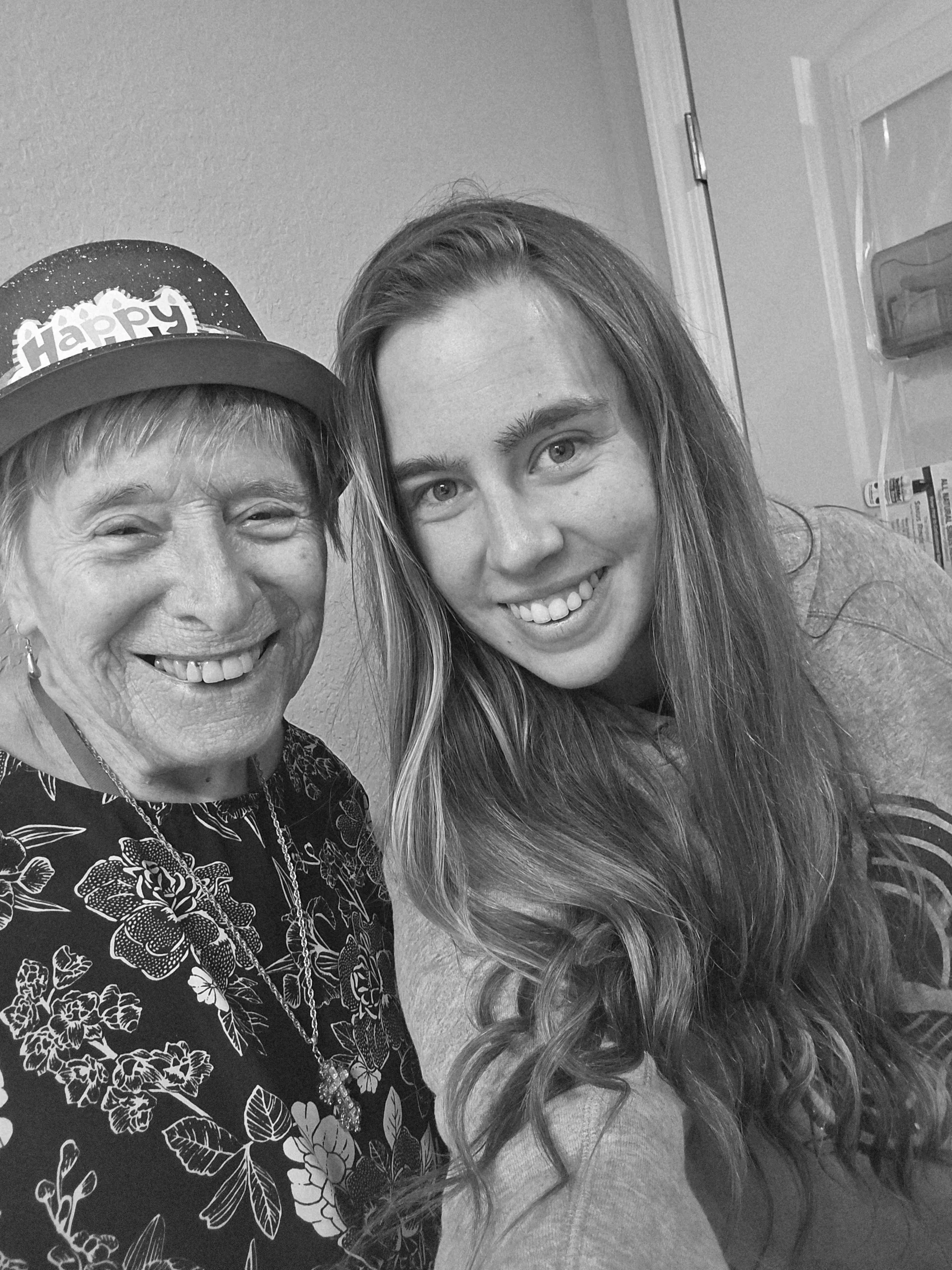 Lexy sharing a joyful moment with a resident